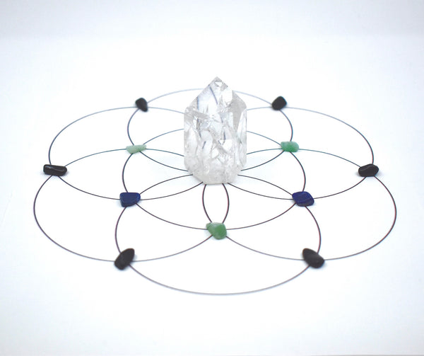 Come As You Are Crystal Grid. Crackle quartz tower, green aventurine gravel, lapis lazuli chips, and black obsidian gravel.